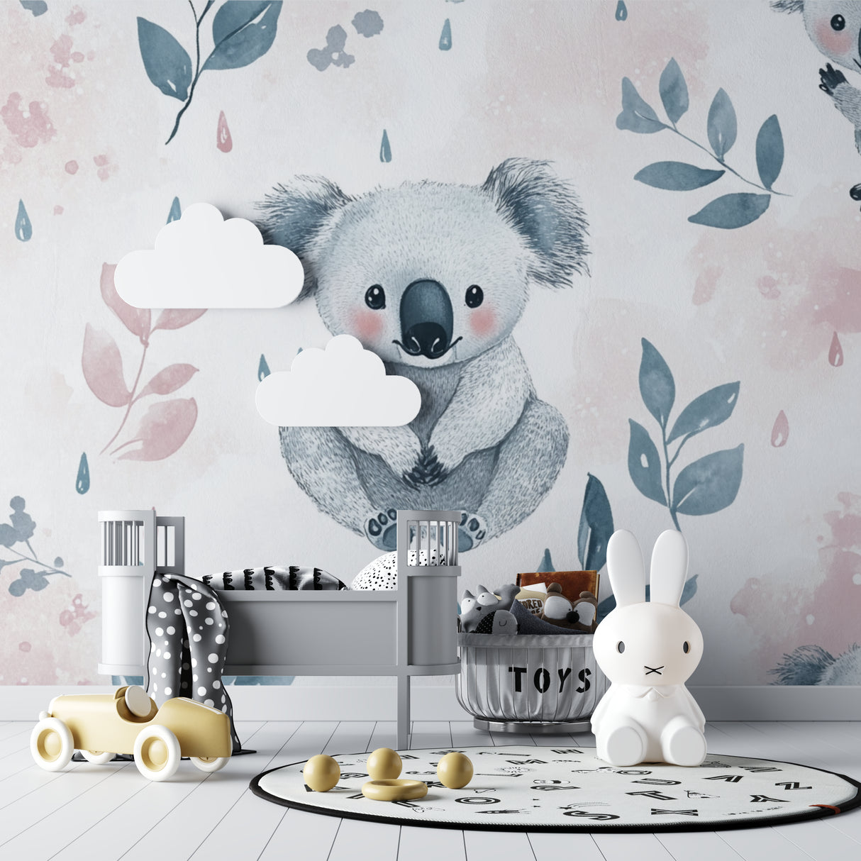 Pink and blue koala wall mural brightening a baby girl's nursery with white crib