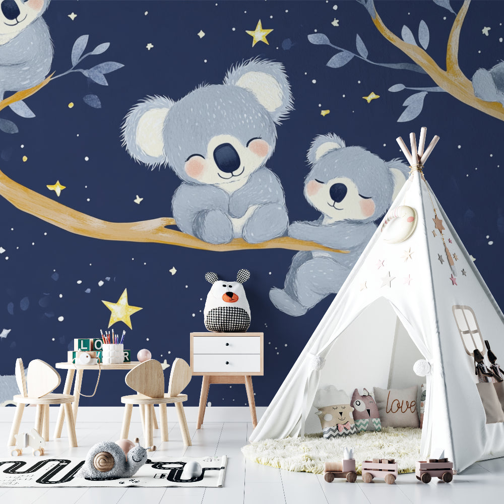 Koala wall mural bringing magic to a baby's nursery with grey and navy decor