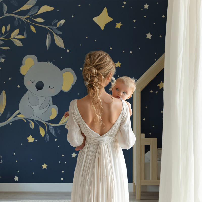Night sky koala wallpaper transforming a playroom into a dreamy space