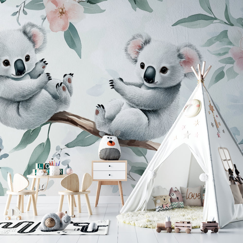 Sweet koala wallpaper mural bringing charm to a pink and grey nursery with rocking chair