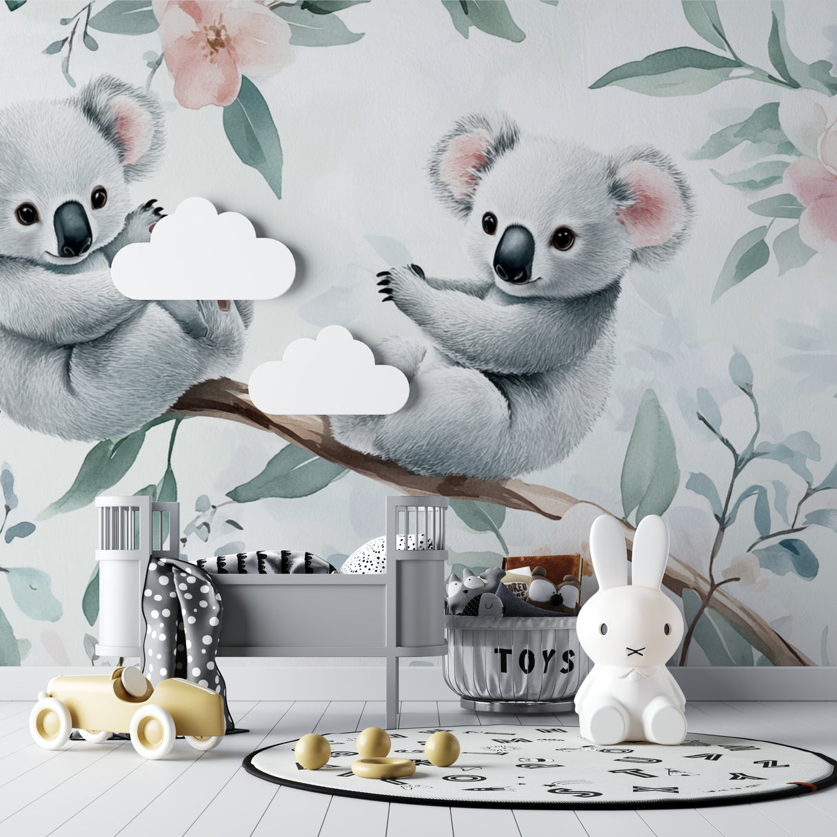 Australian koala wallpaper transforming a minimal nursery with white furniture