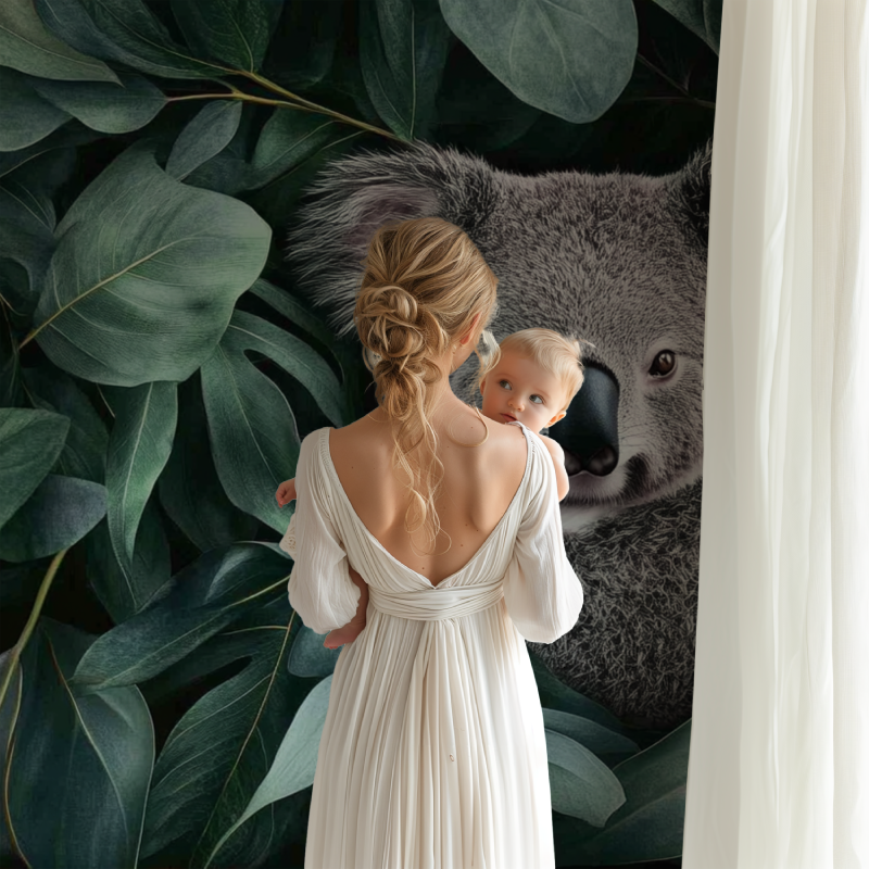 Playroom featuring koala and tropical leaves wallpaper creating a fun learning environment