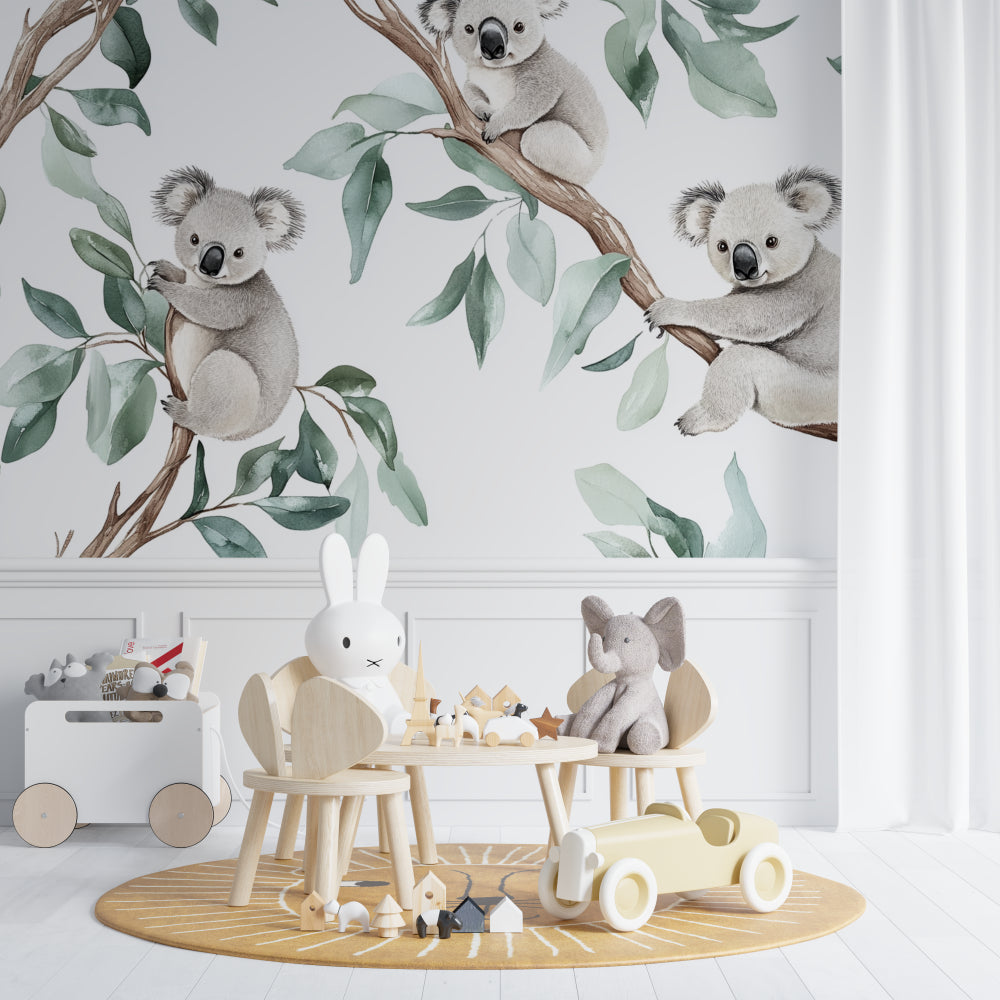 Koala and eucalyptus wallpaper adding charm to a baby's changing area