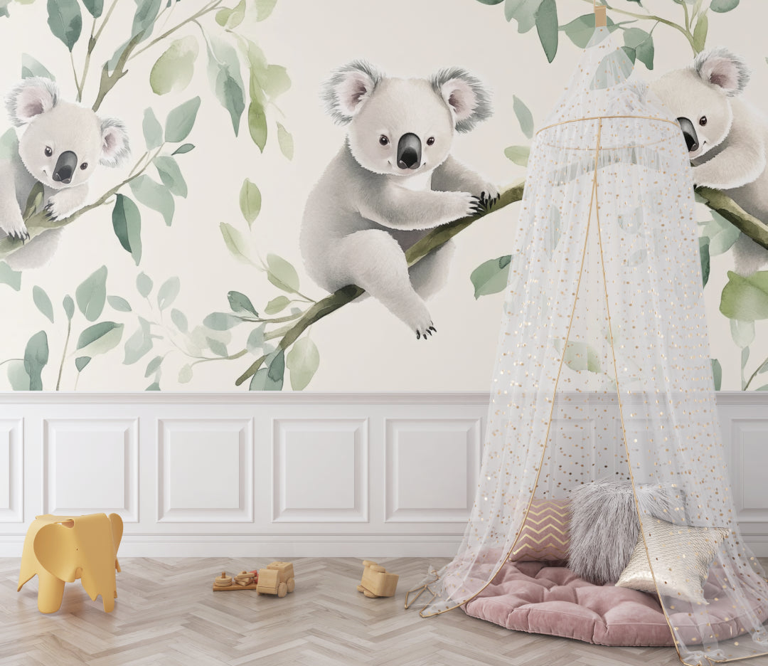 Koala wallpaper mural creating a peaceful atmosphere in a modern nursery with white furniture
