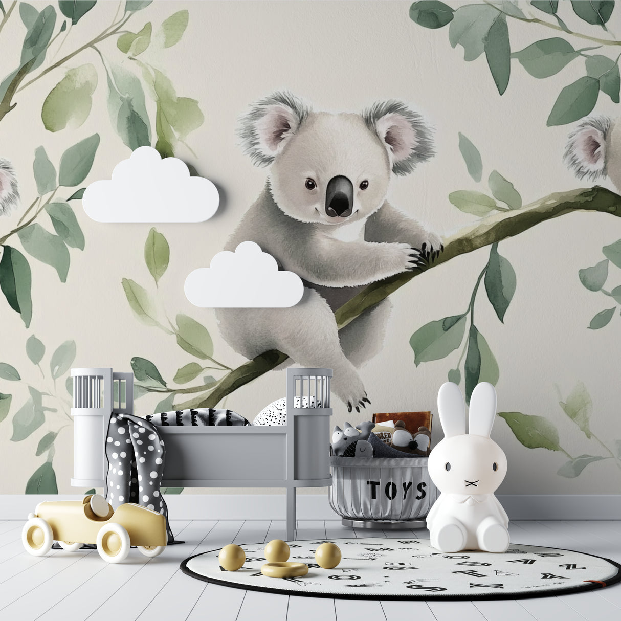 Guest room transformed with gentle koala and eucalyptus leaf mural