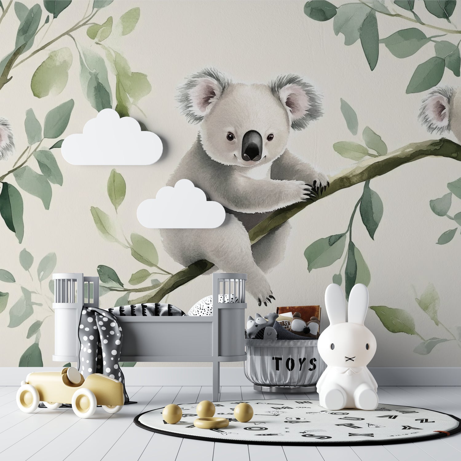 Guest room transformed with gentle koala and eucalyptus leaf mural