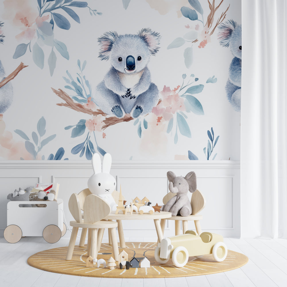 Watercolor koala wall mural brightening a children's reading nook with natural light