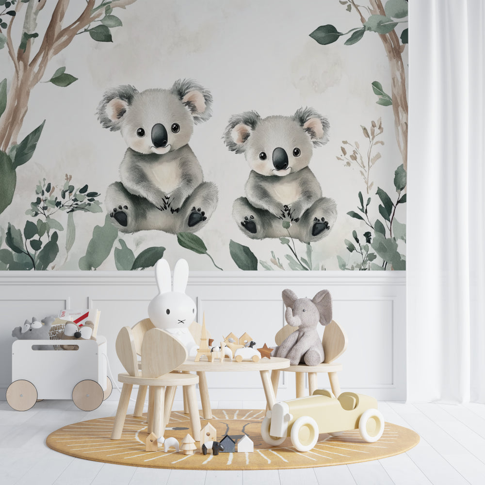 Baby room showcasing watercolor koala mural with grey furniture