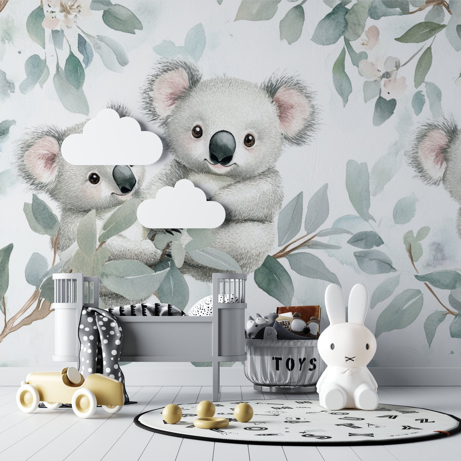 Koala nursery wallpaper creating a peaceful atmosphere in a modern baby room with white furniture