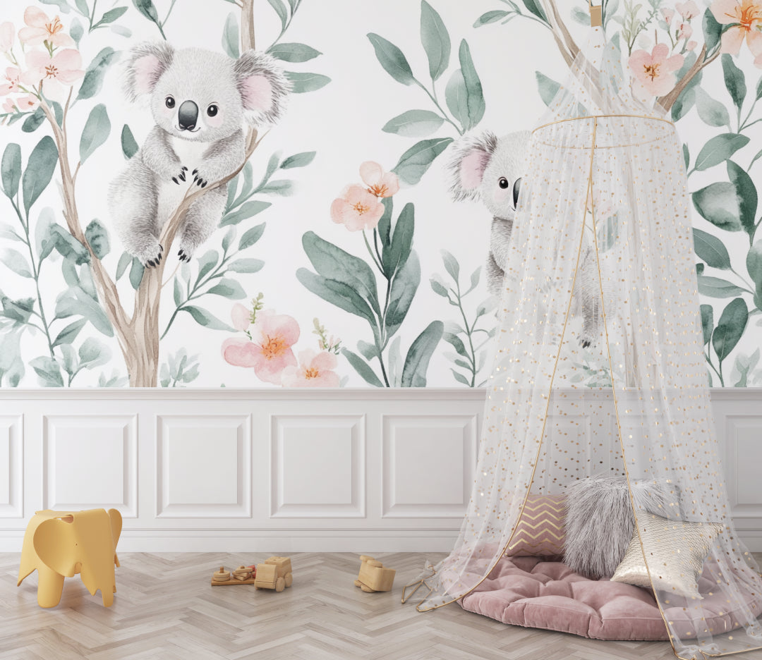 Eucalyptus and koala wallpaper brightening up a baby's room with neutral decor