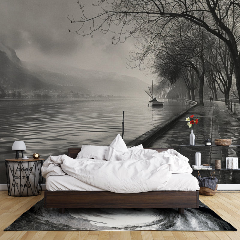 Lake landscape wallpaper in modern living room showing black and white mountain vista creating depth