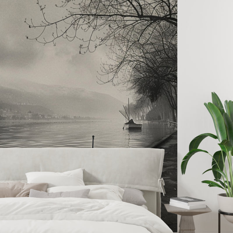 Black and white landscape wallpaper in dining room with lake view