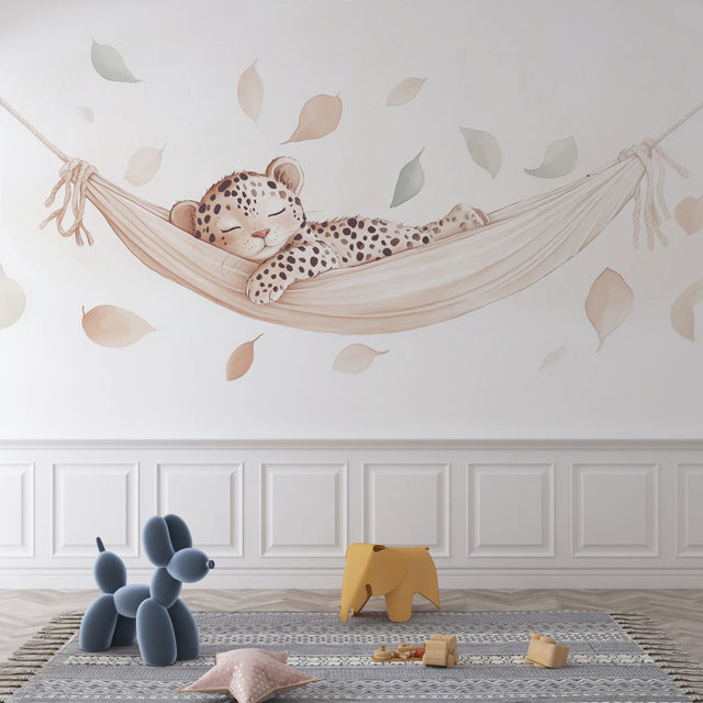 Baby Leopard Wallpaper creating a peaceful nursery atmosphere, shown in a bright modern children's room with natural decor