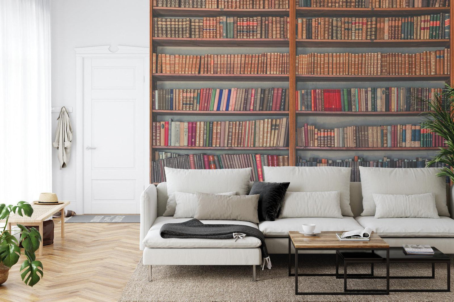 Library wallpaper mural creating a cozy reading nook in a modern living room corner