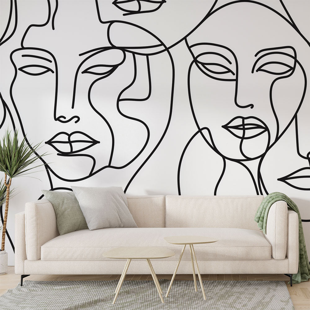 Line art face wallpaper creating a stunning focal point in a modern living room with minimalist furniture