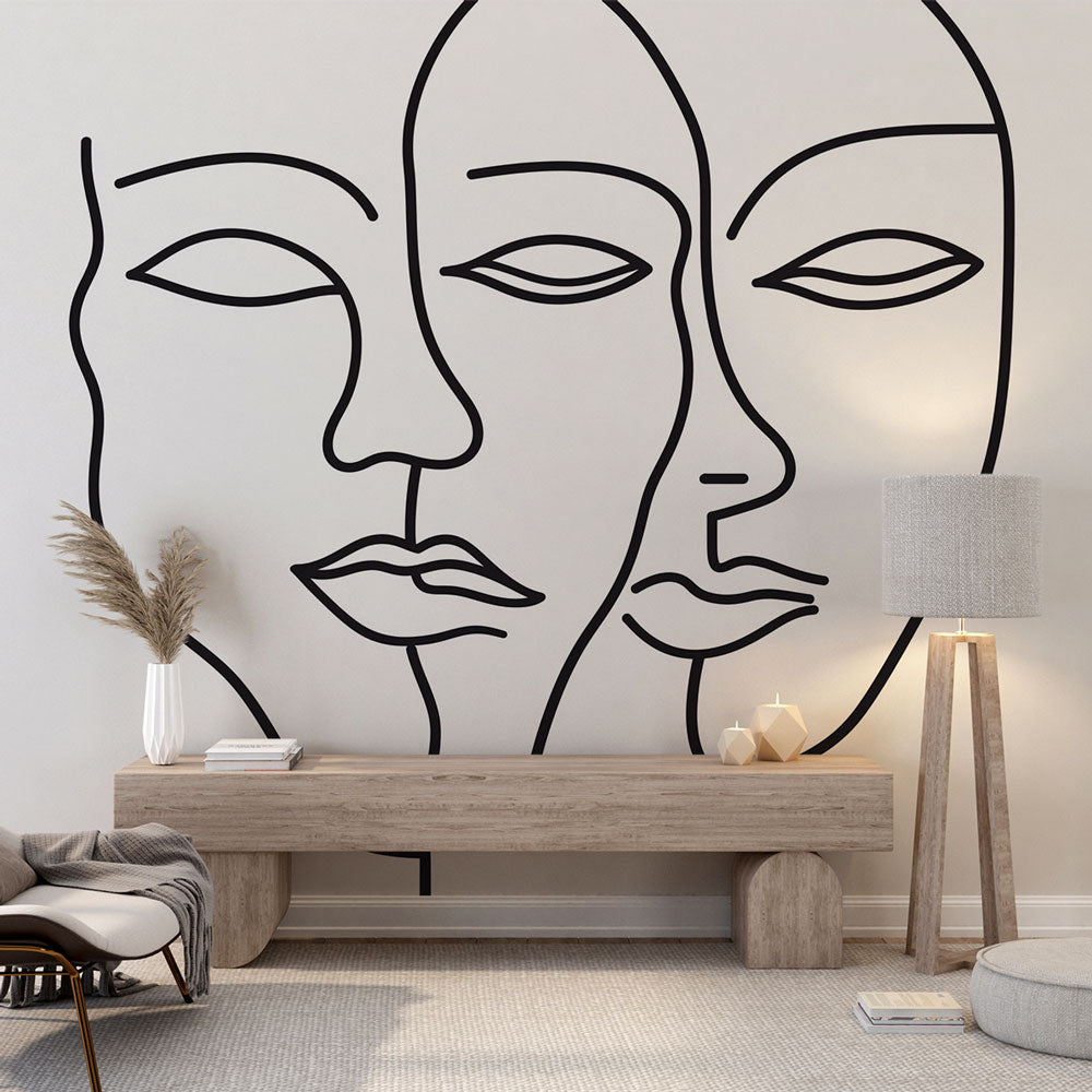 Line art face wallpaper in a modern living room, creating a striking focal point with its minimalist black and white design