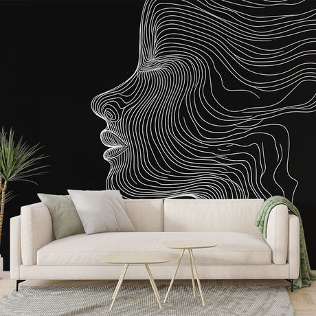 Modern line art wallpaper creating dramatic contrast in a minimalist living room with clean furniture lines