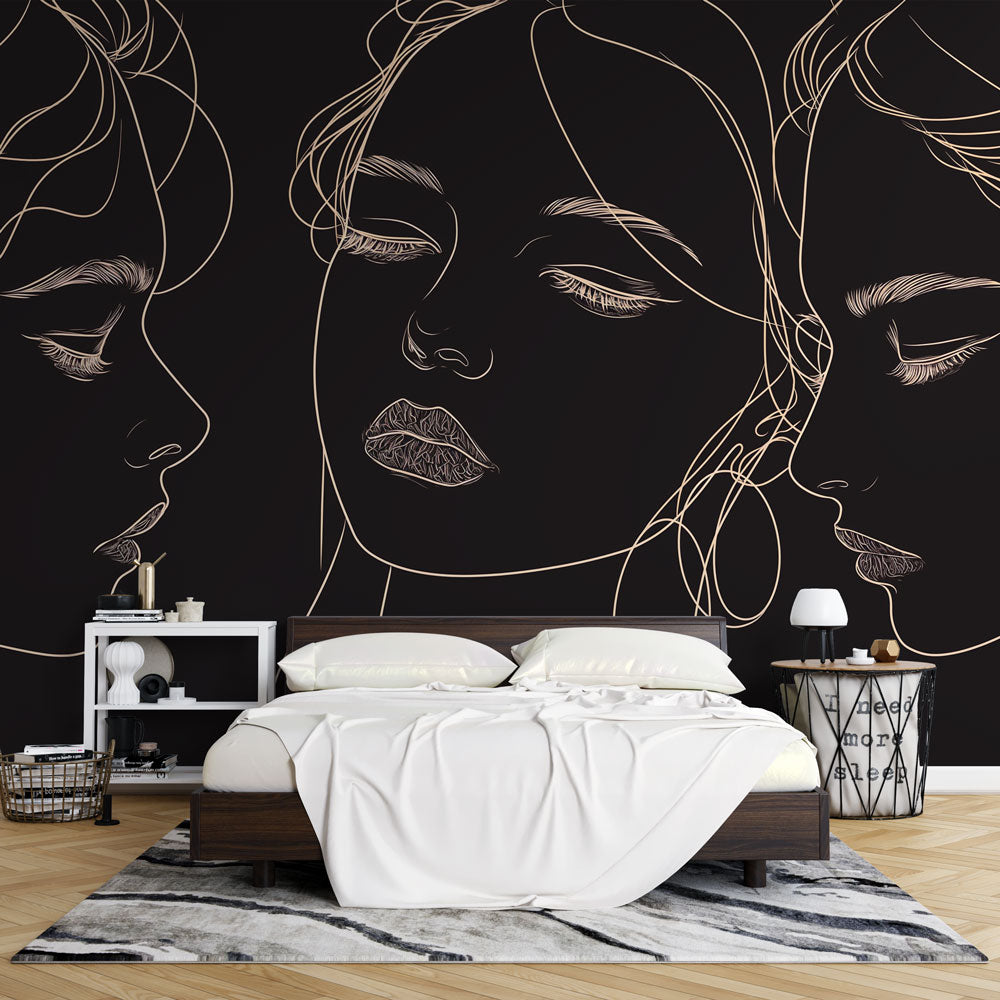 Line art face mural wallpaper in modern black dining room, golden details glowing in natural light
