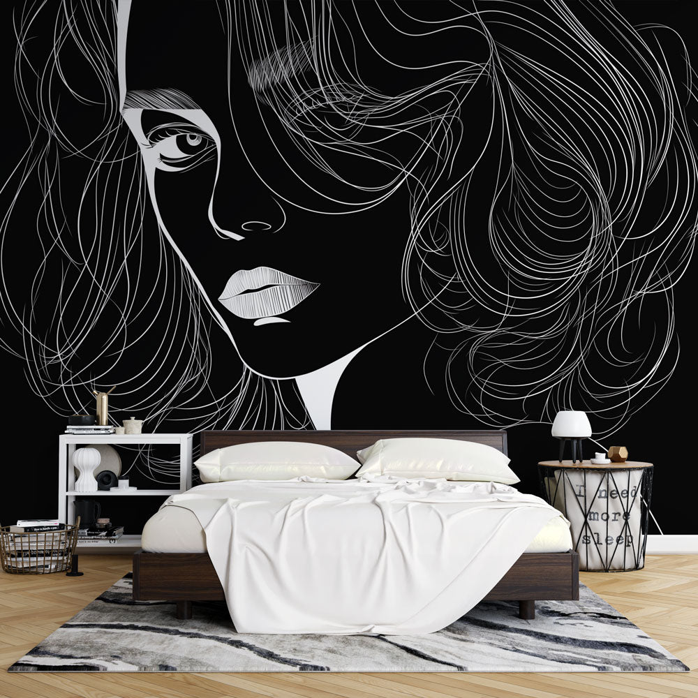 Line art portrait mural wallpaper creating drama in a modern living room with minimalist furniture