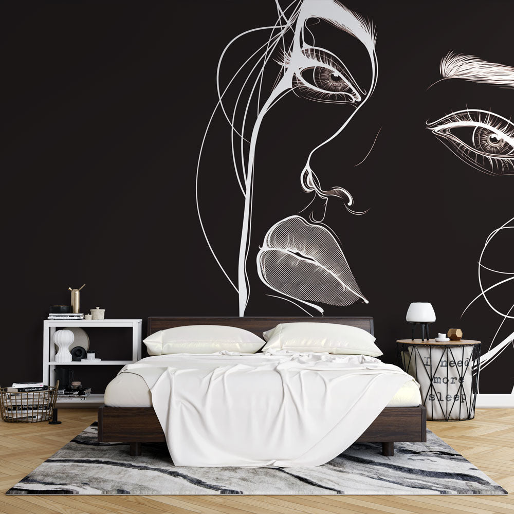 Line art portrait wallpaper creating dramatic impact in a modern living room with minimalist furniture