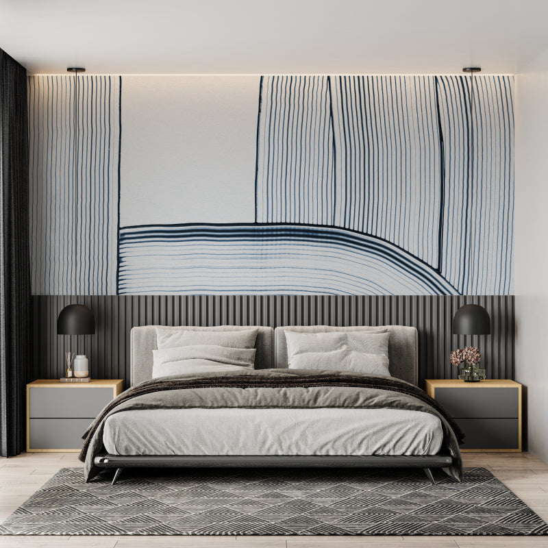 Modern blue line art wallpaper in a bright living room setting with minimal furniture