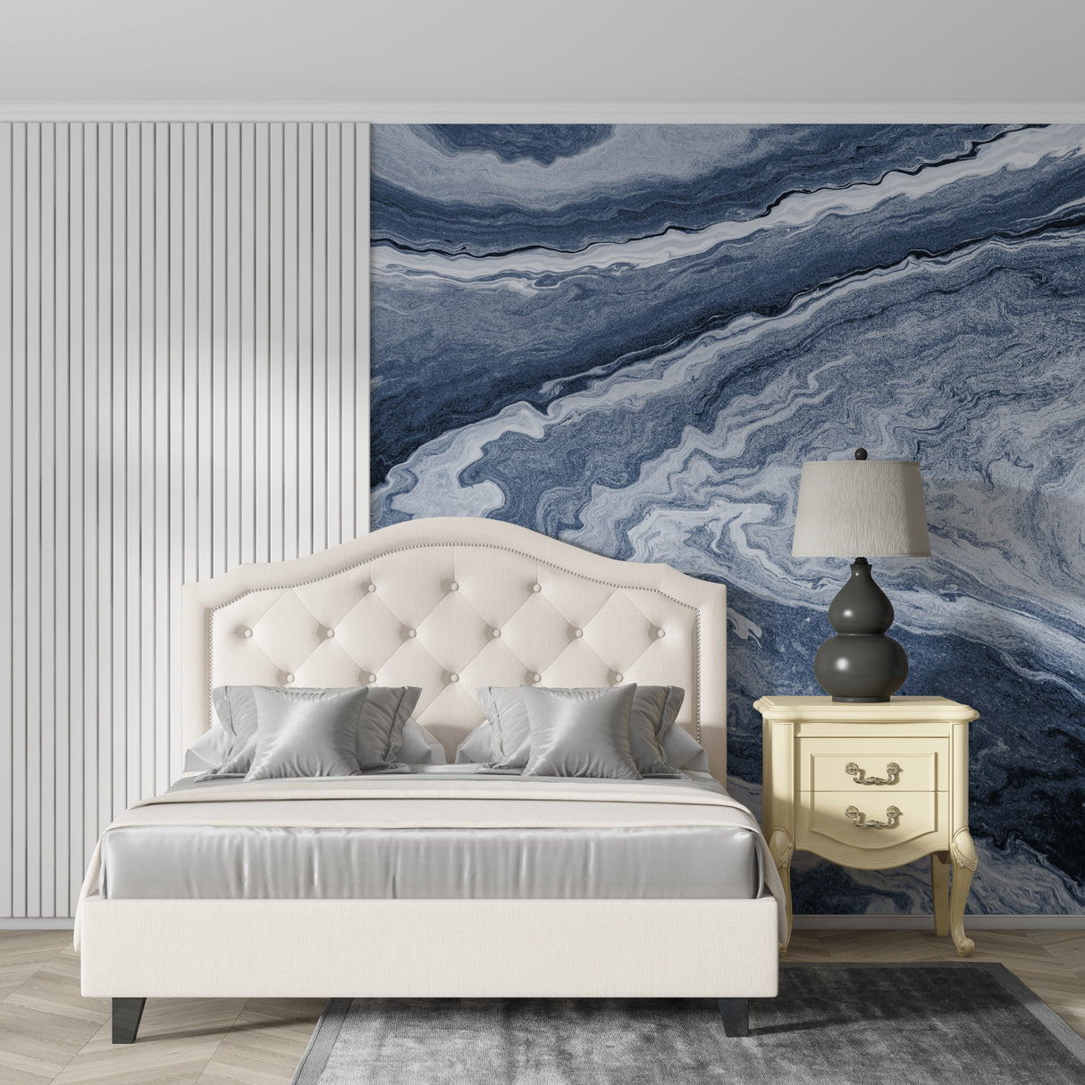 Marble effect feature wall in luxury master bedroom with blue and white waves