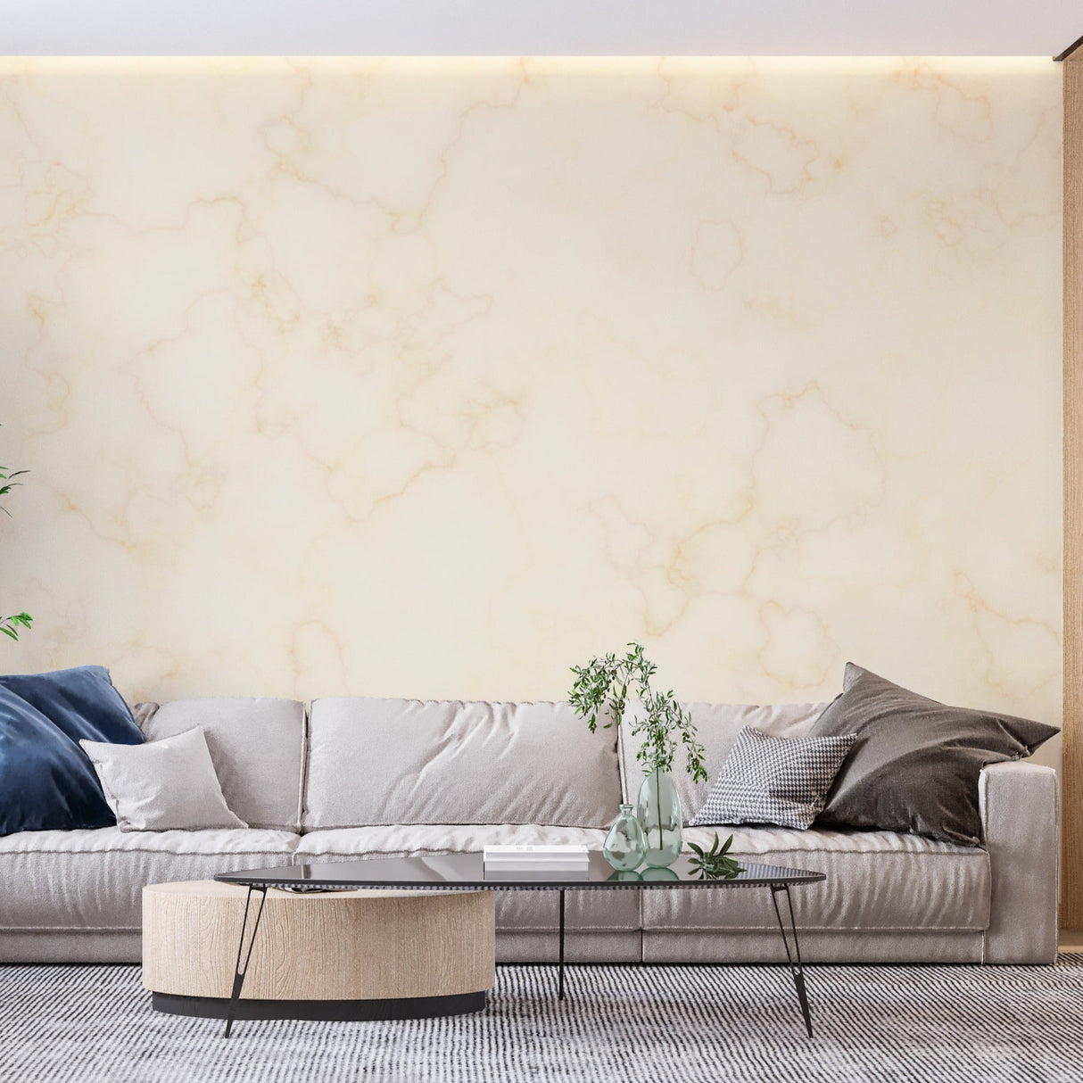 Beige and gold marble wallpaper in modern living room creating an elegant backdrop for grey sofa