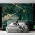 Marble wallpaper with emerald green and gold veins creating luxury impact in modern living room with tall windows