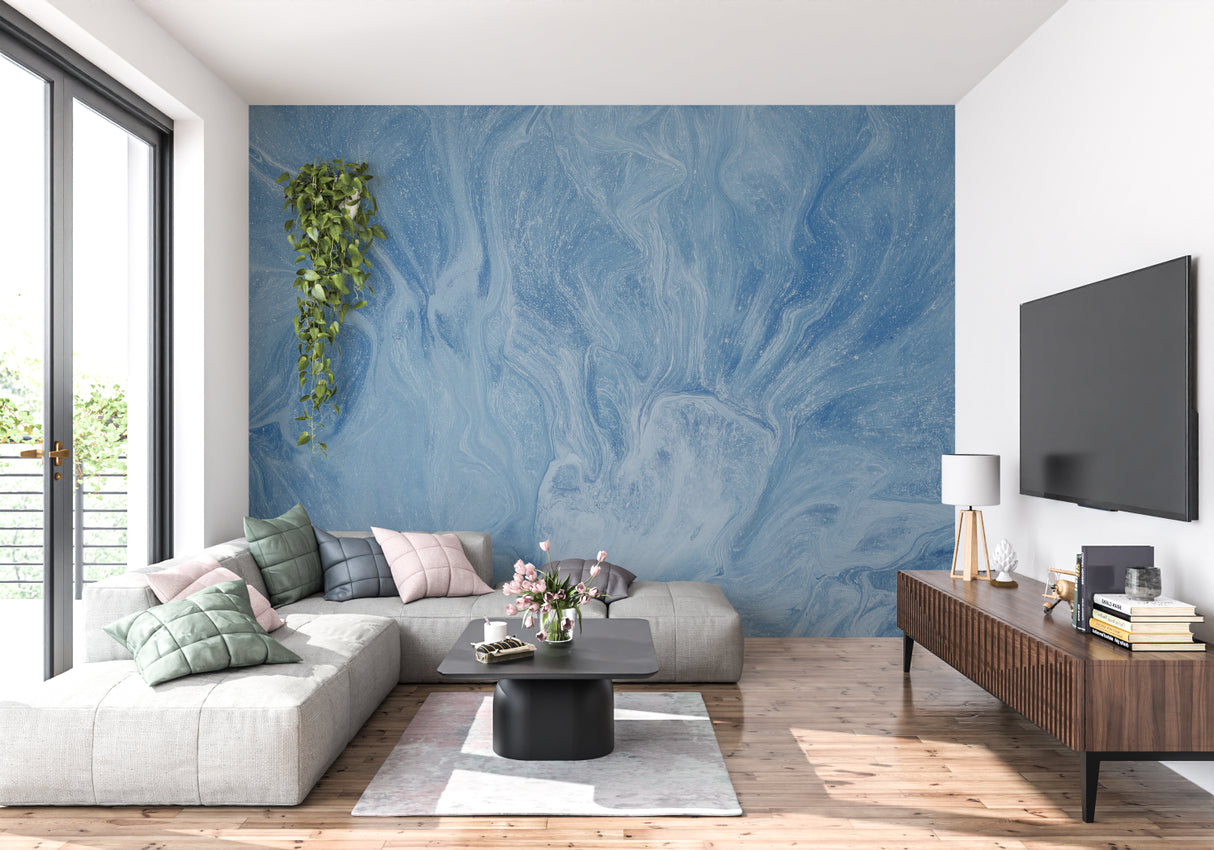 Blue marble wallpaper in modern living room creating a calm, coastal atmosphere