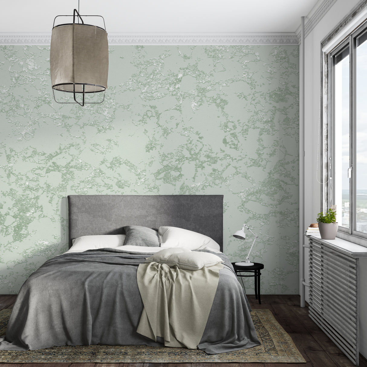 Green marble effect wallpaper making a statement in a minimal home office