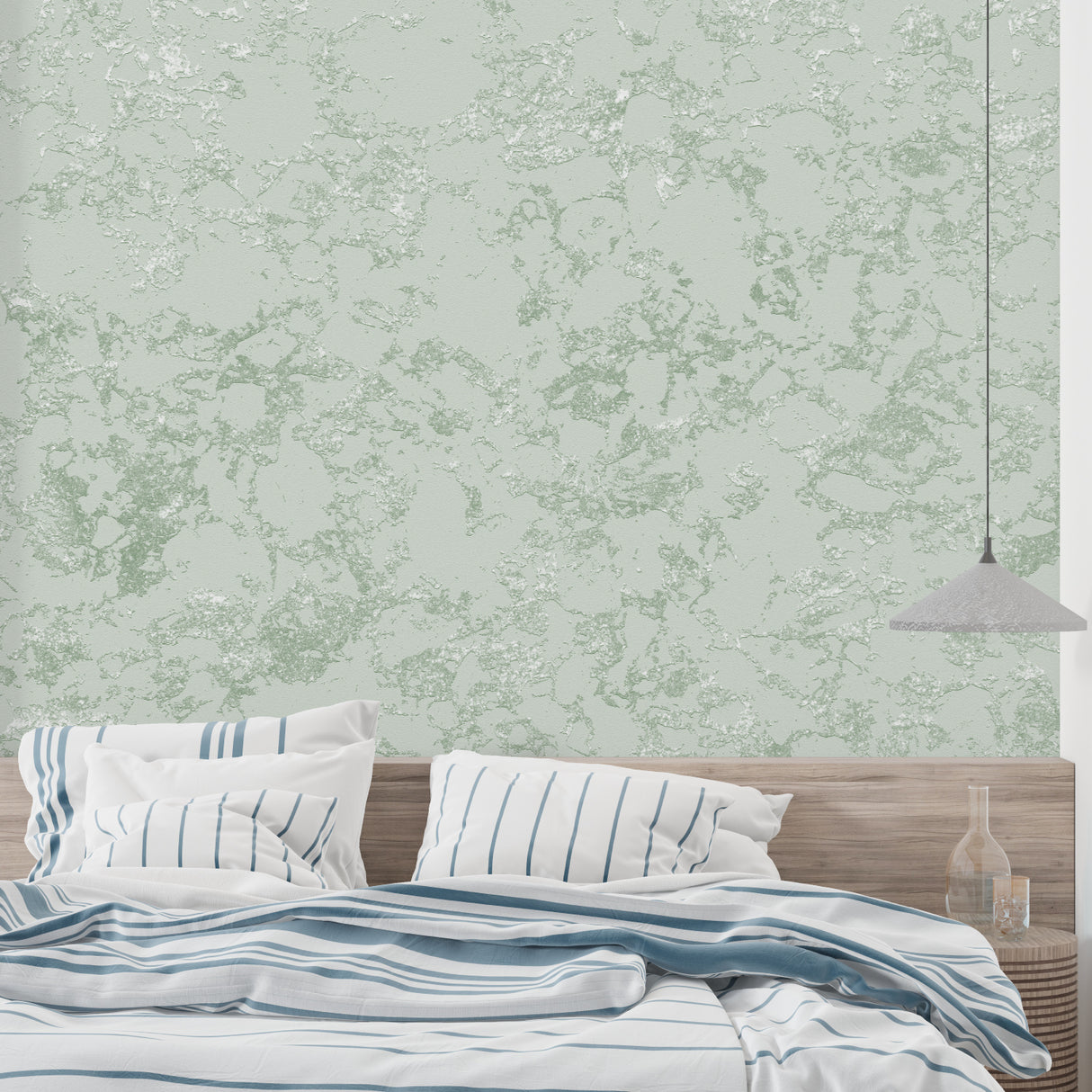 Sage green textured wallpaper bringing natural elegance to a master bedroom