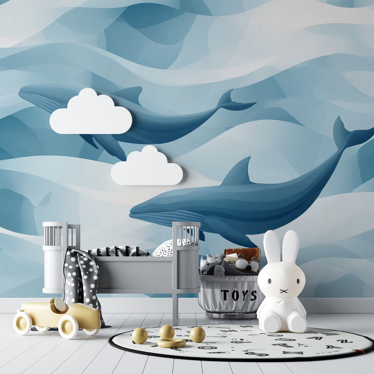 Blue whale wallpaper bringing ocean vibes to a child's bedroom with geometric patterns