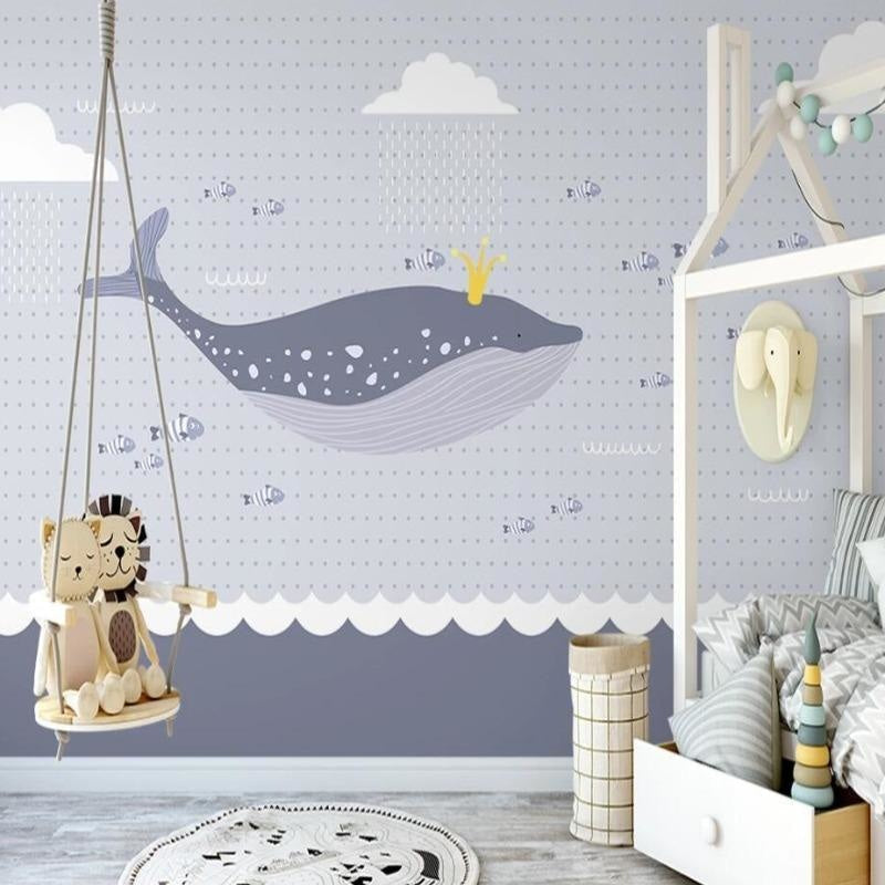 Ocean whale wallpaper transforming a kids bedroom with soft gray and white tones
