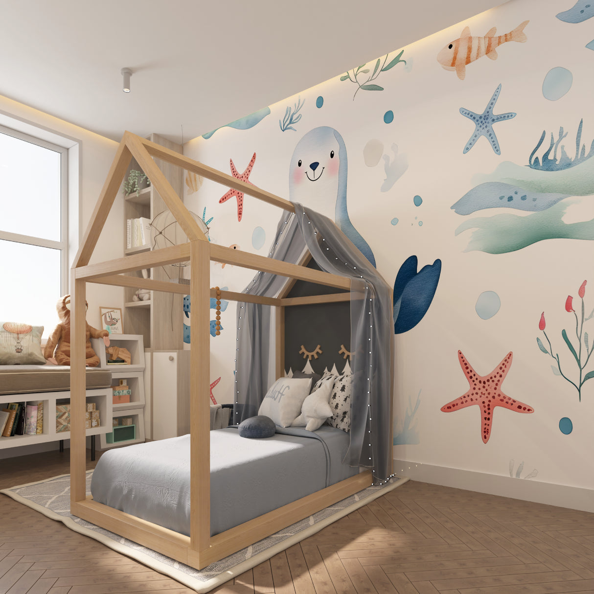 Marine life wallpaper in playroom showing scale and color matching with blue furniture
