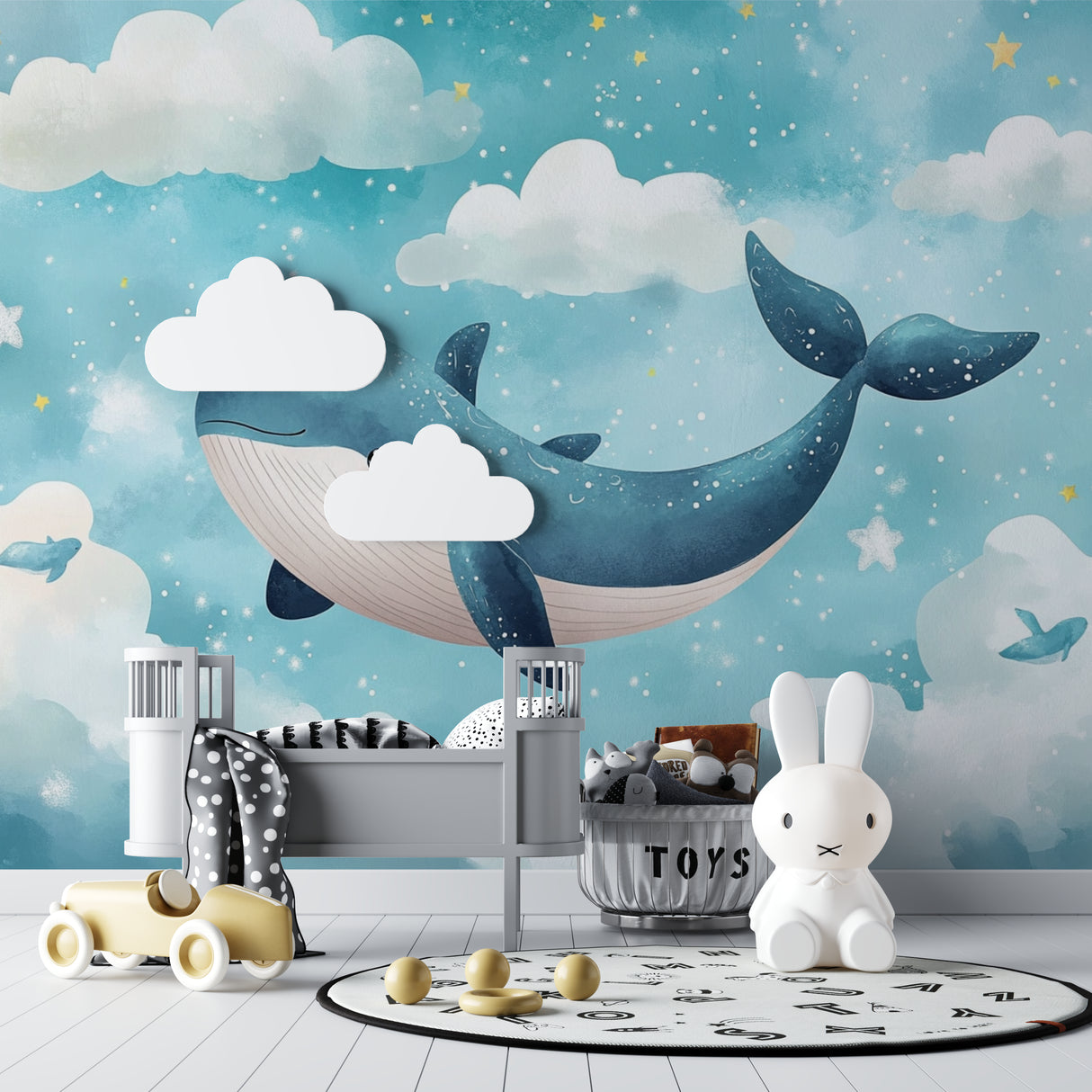 Whale and stars wallpaper in a cozy nursery with soft lighting showing the magical nighttime effect
