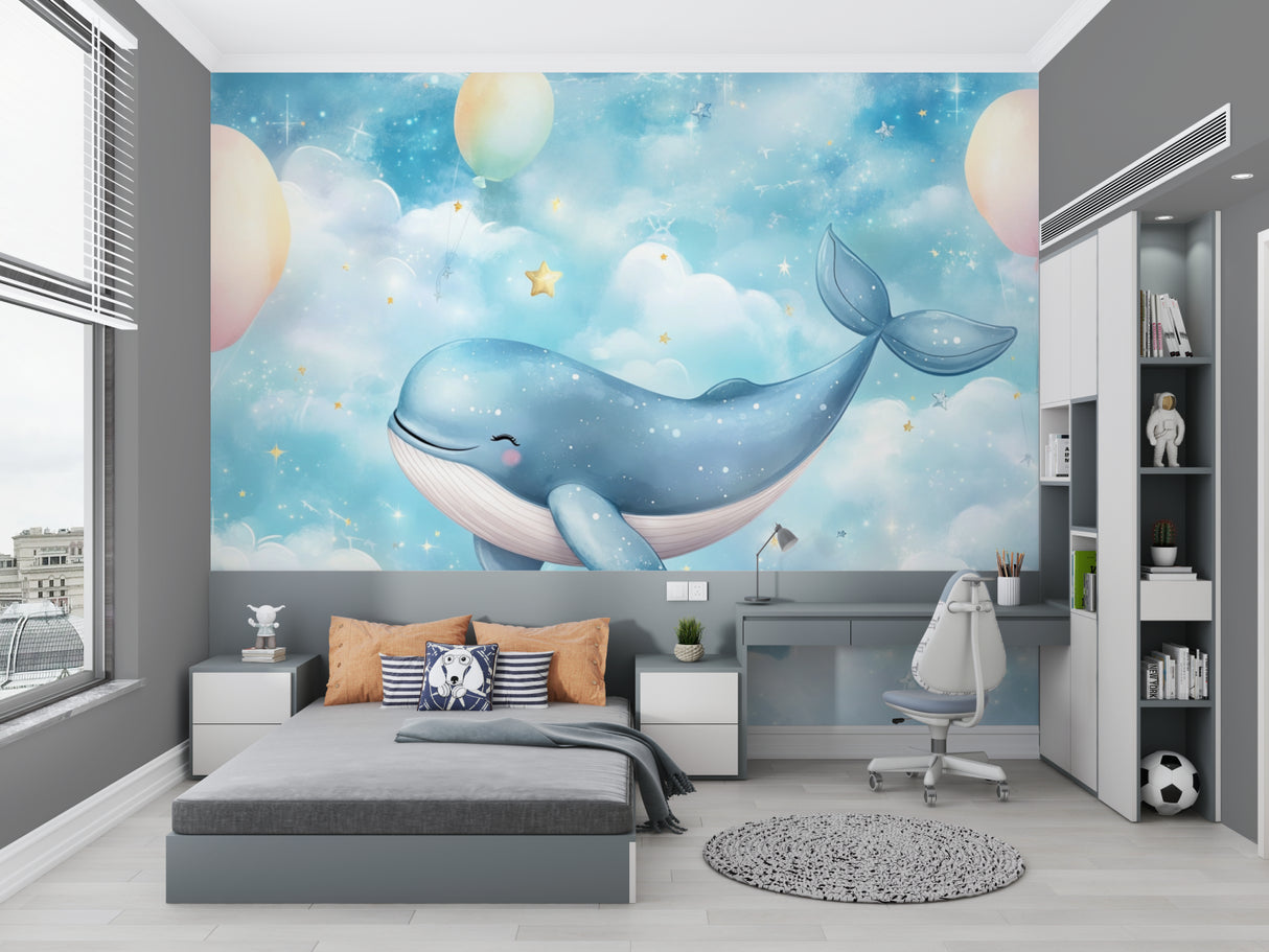 Ocean themed wall mural featuring whales in a cozy playroom setting