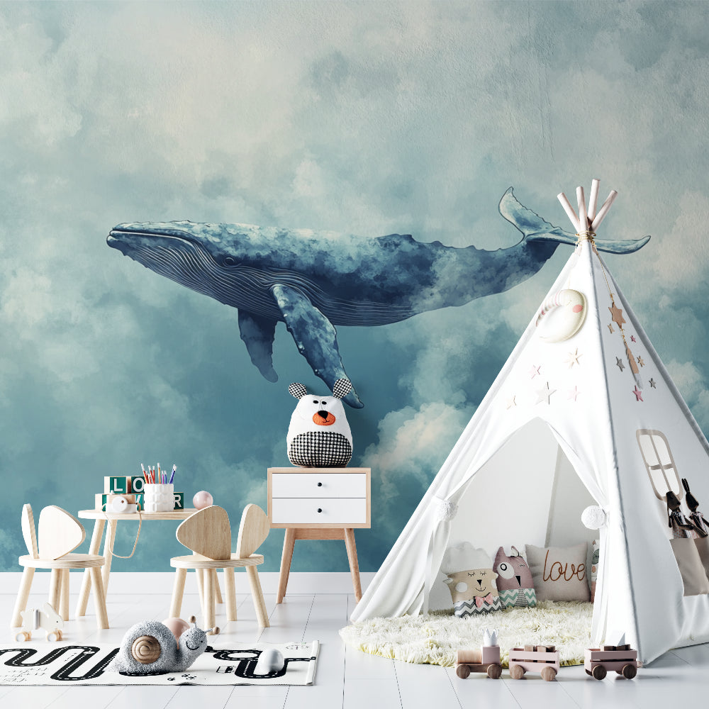 Marine whale wallpaper in modern nursery with white furniture, showing scale and dreamy atmosphere