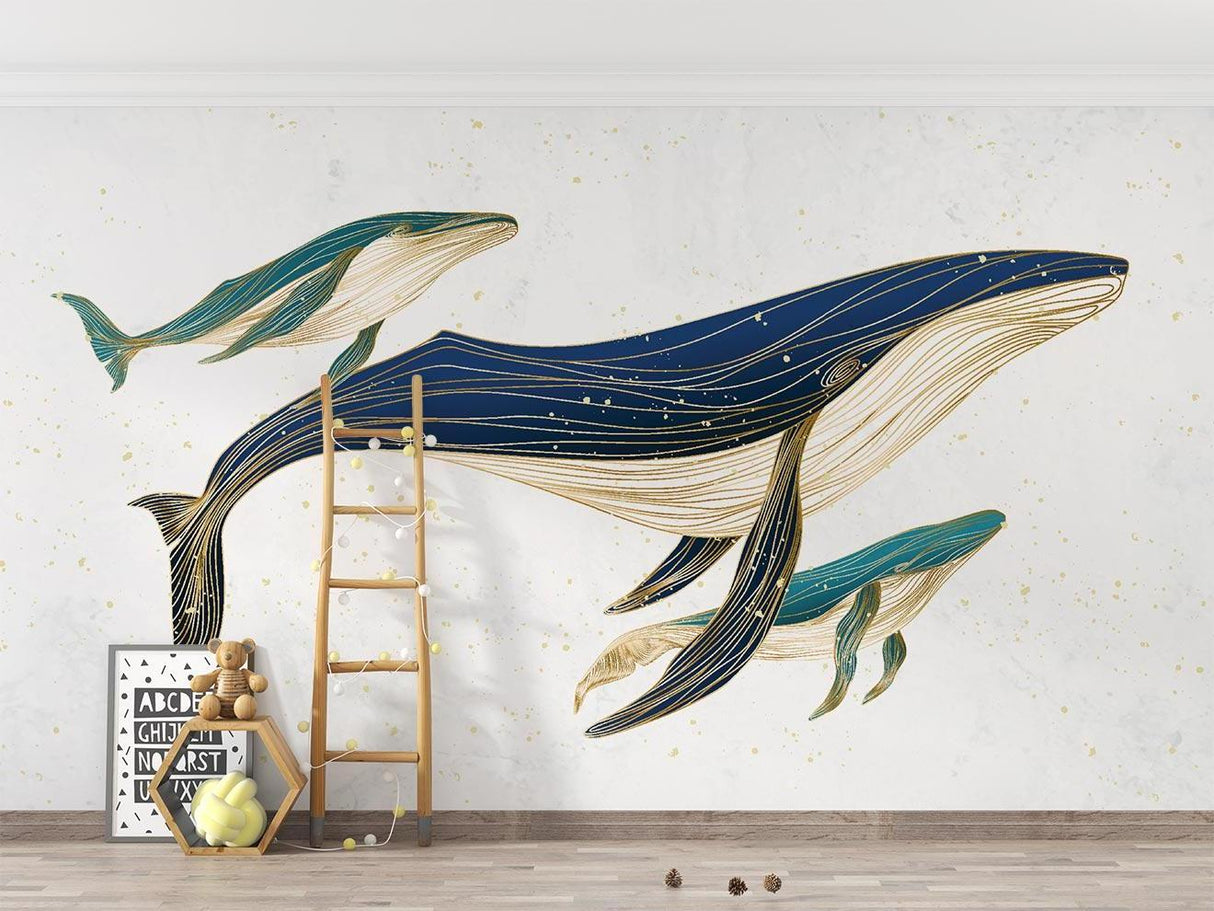 Whale family wall mural bringing ocean charm to a coastal-style living room with natural decor