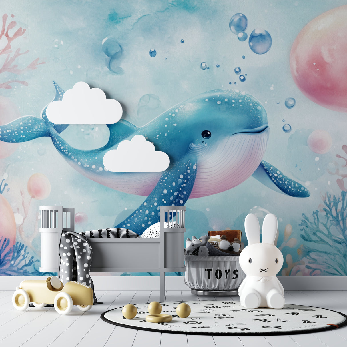 Marine animals wallpaper creating a peaceful atmosphere in a modern nursery with soft blue whale design
