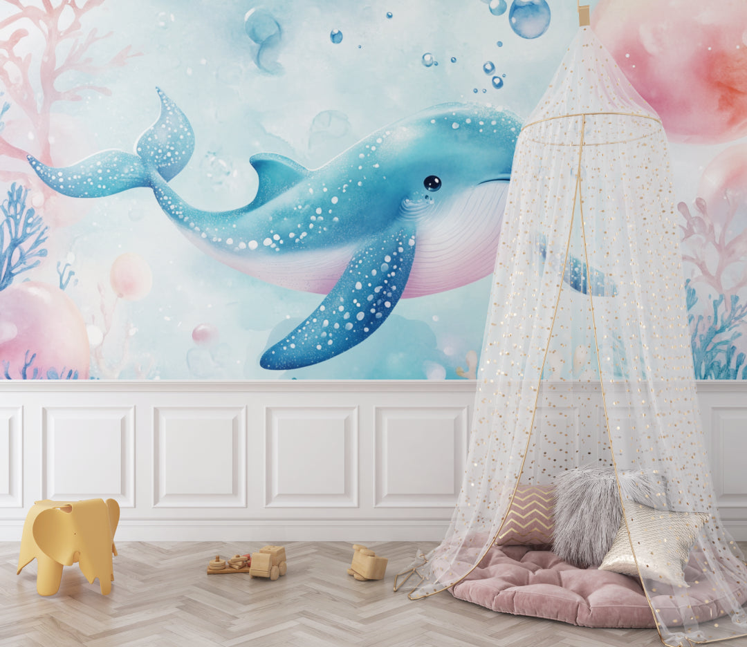 Underwater wallpaper bringing calm vibes to a baby's room with floating whale design