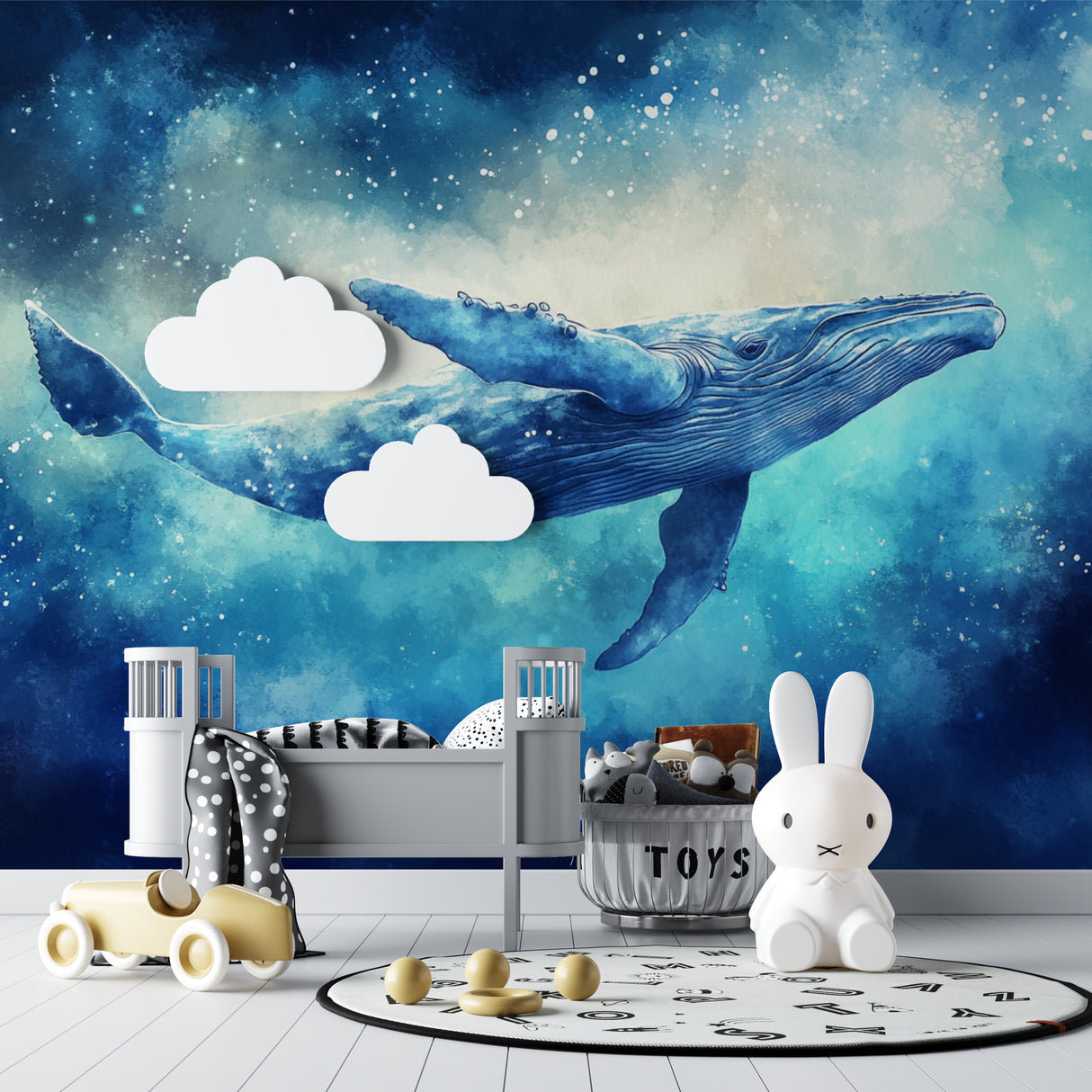 Underwater whale wallpaper transforming a nursery with gentle blue tones