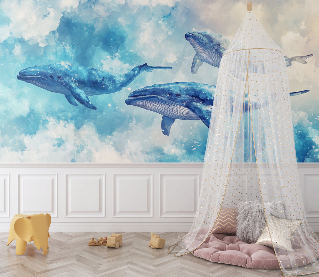 Nautical wall mural showcasing gentle whales in a cozy reading nook