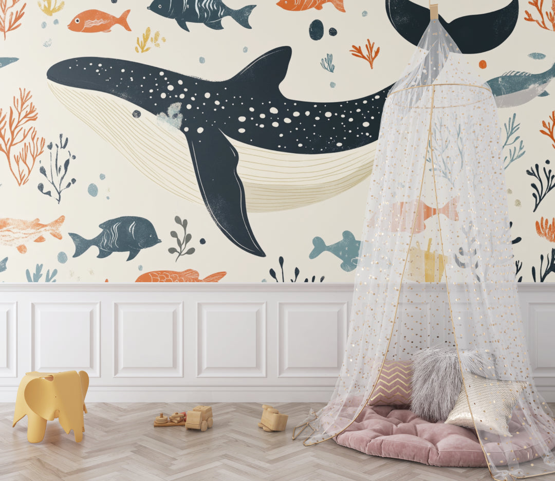 Ocean theme wall mural bringing life to a kids bedroom with playful whale and fish designs