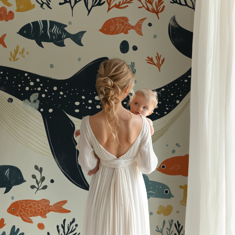 Marine life wall mural creating a calm atmosphere in a baby's room with neutral decor