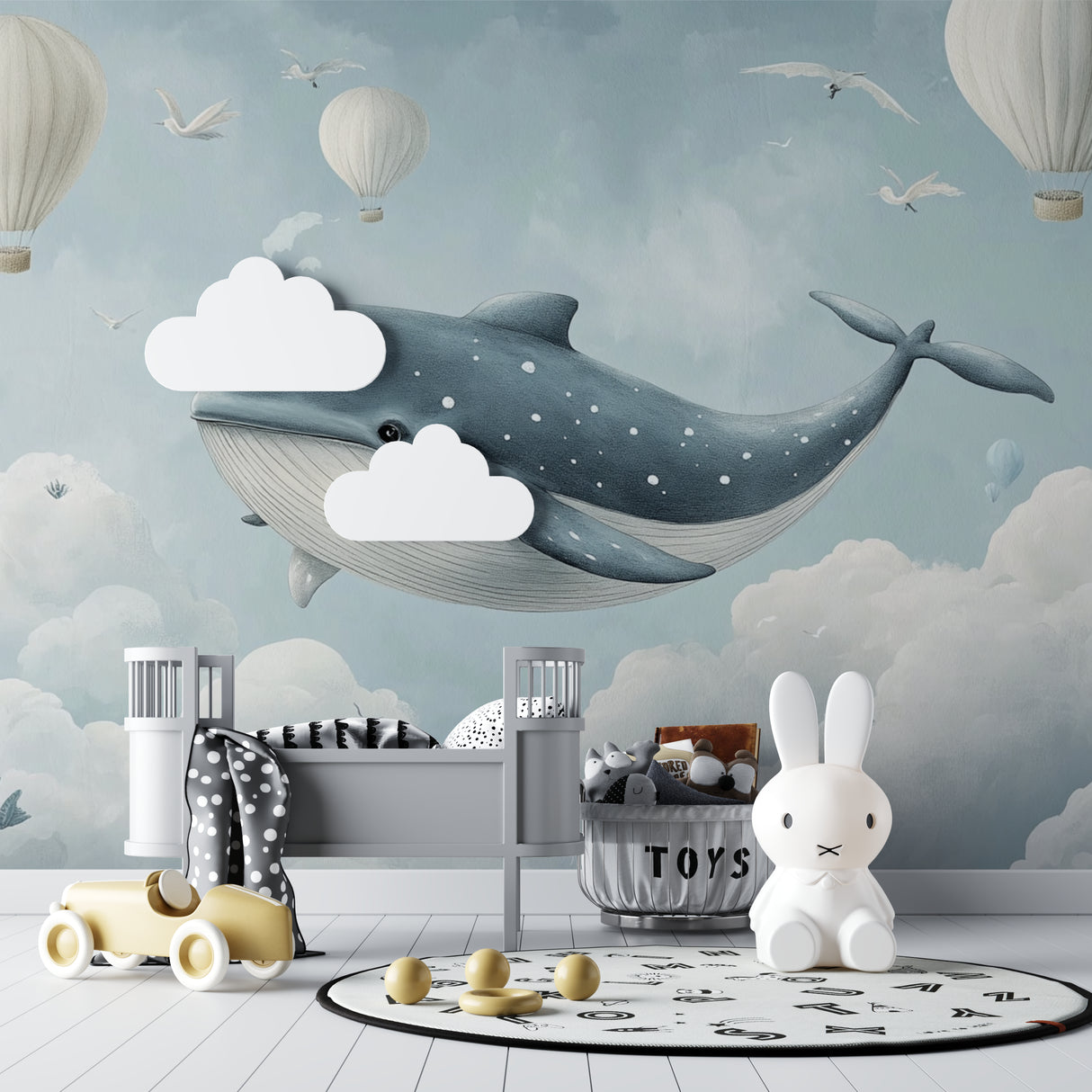 Whale wall mural featured in cozy reading nook with rocking chair