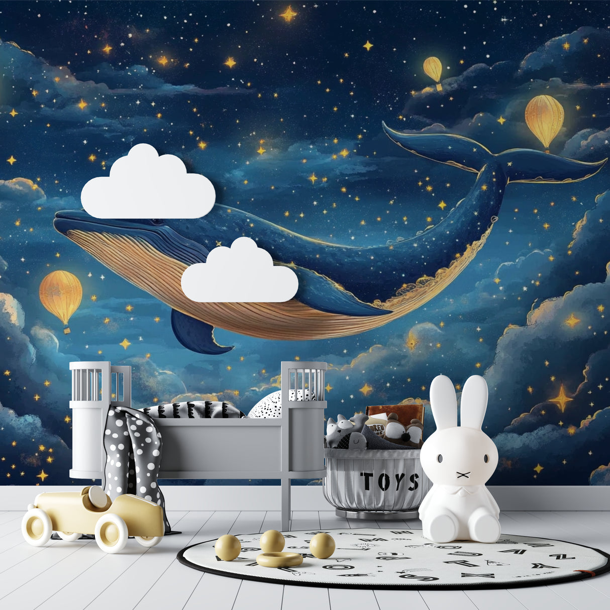 Magical whale wallpaper displayed in a playroom with complementary blue furnishings