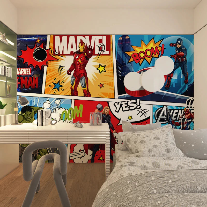 Children's bedroom with Marvel-themed wall art and desk.