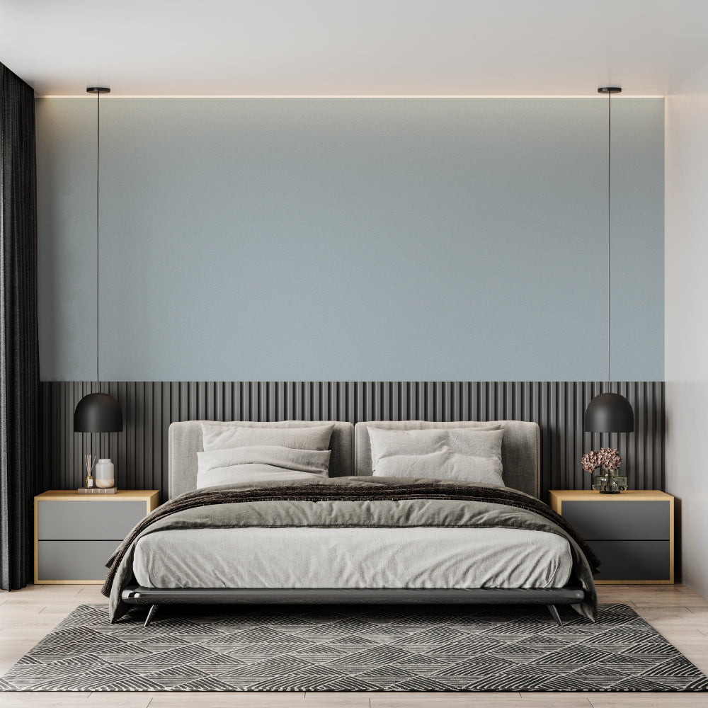 Blue solid color wallpaper creating calm atmosphere in master bedroom setting
