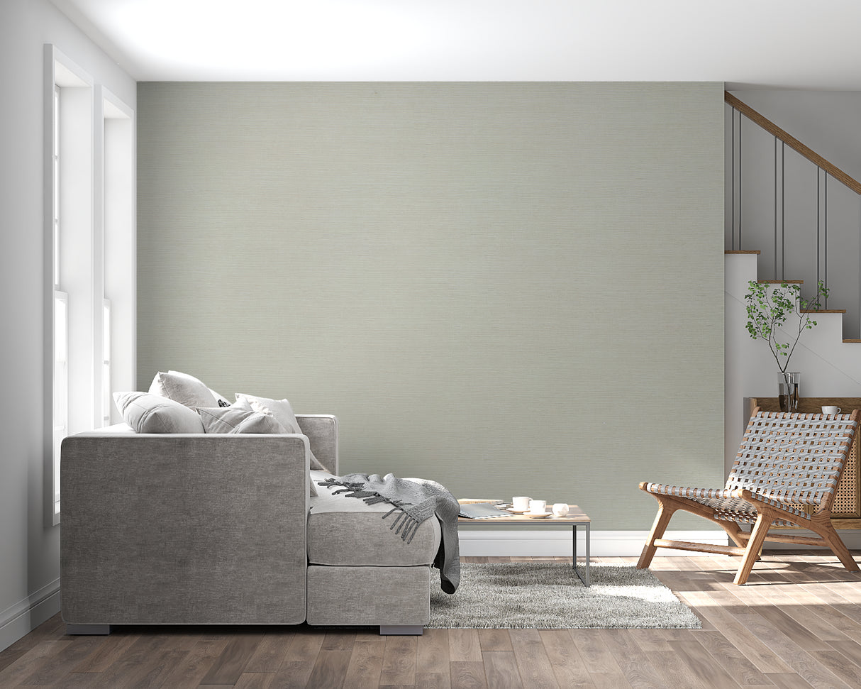 Textured sage green wall mural in a home office highlighting its subtle woven pattern