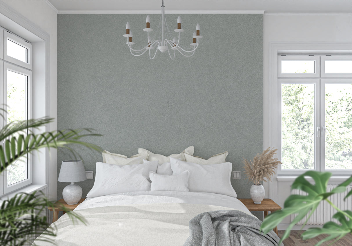 Sage grey textured wall mural in minimalist bedroom creating calm atmosphere